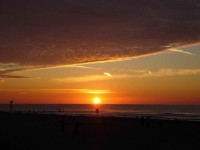 západ slunce | Takhle zapadá slunce nad mořem v Scheveningenu